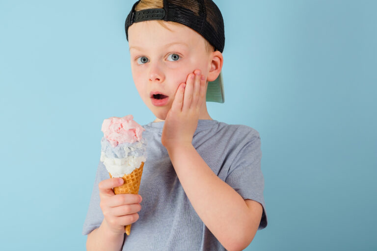 little boy ate ice cream and experienced tooth pain-Dental Emergencies in Children-Forest Hill Family Dental